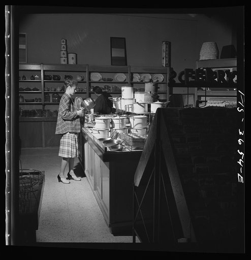 Untitled photo, possibly related to: Greenbelt, Maryland. Interior of the Greenbelt variety store, a cooperative where garden tools, seeds, kitchen utensils, clothes, etc. are sold