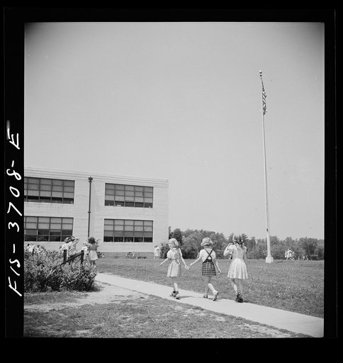 Untitled photo, possibly related to: Greenbelt, Maryland. Federal housing project. Children going home from school