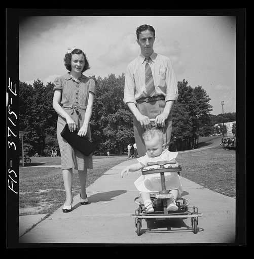 Greenbelt, Maryland. Family strolling on Sunday