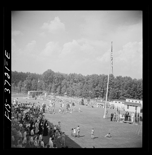 Greenbelt, Maryland. Bird's-eye view of the Memorial Day ceremony, with the swimming pool in the background