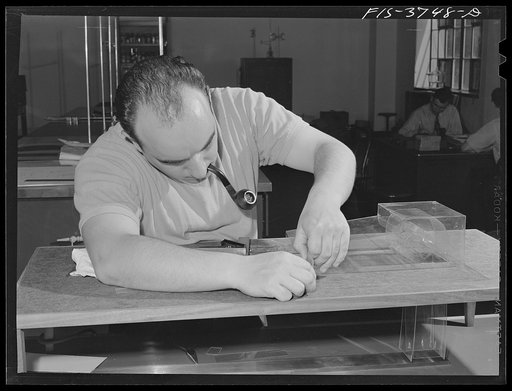 Untitled photo, possibly related to: Working on scale model of new tunnel dryer for dehydration developed by the engineering and development division of the regional agricultural laboratory. Albany, California