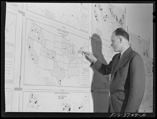 Dr. W.D. Ramage, senior industrial analyst, with agricultural charts. Regional agricultural research laboratory, Albany, California