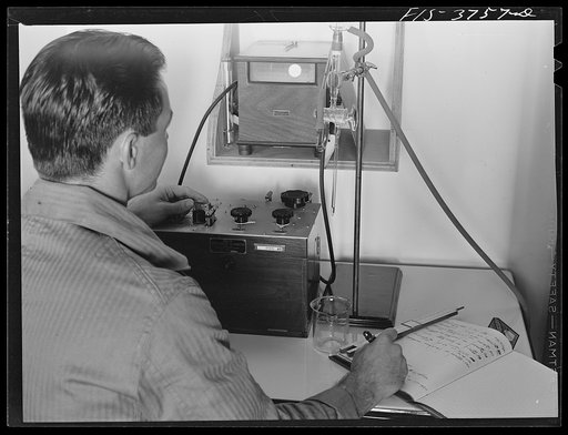 J.D. Ponting, junior chemist in division of commodity processing, conducts a galvanometer test on vitamin C content of dehydrated vegetable. Regional agricultural research laboratory, Albany, California