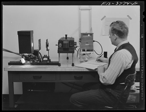 Dr. H.J. Dutton, assistant chemist, runs a spectrometric test for determination of carotene content of dehydrated vegetables. Regional agricultural research laboratory, Albany, California