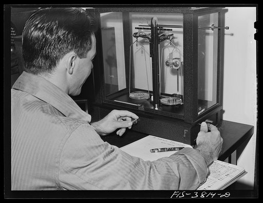 The balance in used in accurate weighing of small samples of dehydrated vegetables. Regional agricultural research laboratory, Albany, California