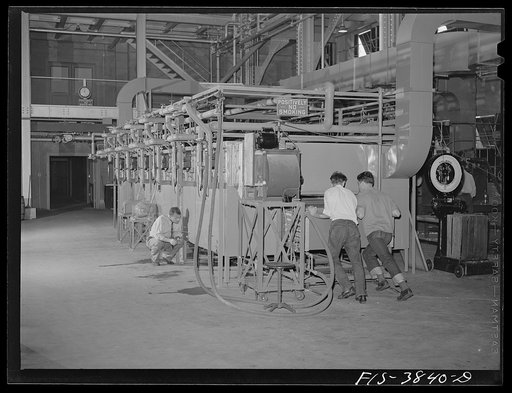 Charging the tunnel dehydrater at the regional agricultural research laboratory. Albany, California