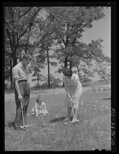 Sheffield, Alabama (Tennessee Valley Authority (TVA)). The Hall family playing croquet at their home on a defense housing project