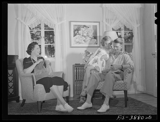 Sheffield, Alabama (Tennessee Valley Authority (TVA)). Kenneth C. Hall and family in the living room of their home on a defense housing project