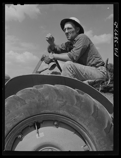 Lauderdale County, Alabama. Tennessee Valley Authority (TVA). Julien H. Chase uses machinery extensively on his 500 acre farm