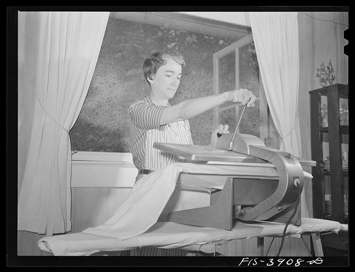 Lauderdale County, Alabama. Tennessee Valley Authority (TVA). Mrs. Case using an electric mangle
