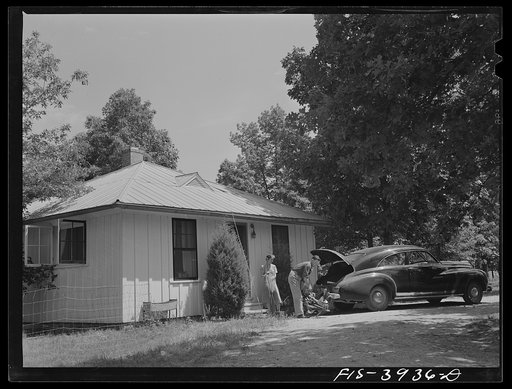 Lauderdale County, Alabama. Tennessee Valley Authority (TVA). Mr. and Mrs. Case prepare to leave for a camping trip on the shores of one of the numerous lakes created by the TVA system