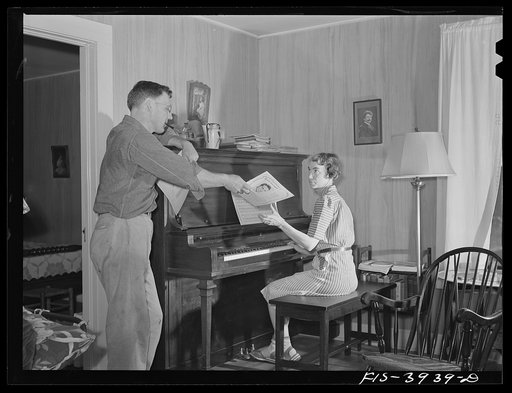 Lauderdale County, Alabama. Tennessee Valley Authority (TVA). Mrs. Case playing the piano for her husband