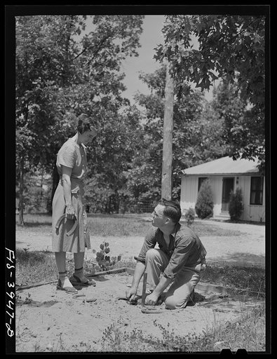 Untitled photo, possibly related to: Lauderdale County, Alabama. Tennessee Valley Authority (TVA). Julien H. Case and his wife pitching horseshoes on their farm