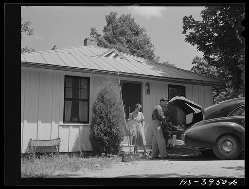 Untitled photo, possibly related to: Lauderdale County, Alabama. Tennessee Valley Authority (TVA). Mr. and Mrs. Case packing for a camping trip on one of the many TVA lakes