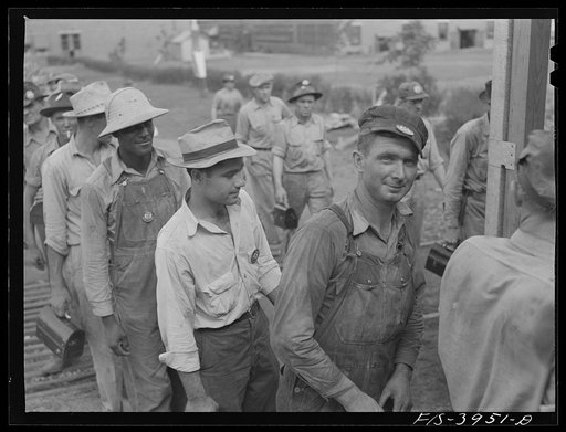 Untitled photo, possibly related to: Wilson Dam, Alabama (Tennessee Valley Authority (TVA)). Workers checking out at end of shift at a chemical engineering plant
