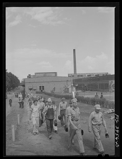 Untitled photo, possibly related to: Wilson Dam, Alabama (Tennessee Valley Authority (TVA)). Workers leaving the chemical engineering plant