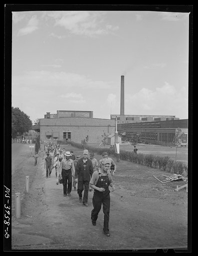Untitled photo, possibly related to: Wilson Dam, Alabama (Tennessee Valley Authority (TVA)). Workers leaving the chemical engineering plant
