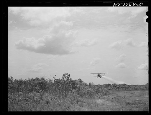 Wilson Dam, Alabama (Tennessee Valley Authority (TVA)). Planes spread insecticide to kill malaria-carrying mosquitoes