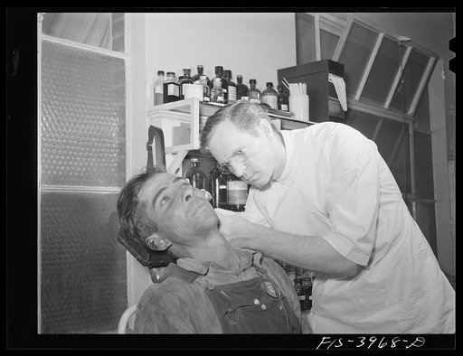 Untitled photo, possibly related to: Wilson Dam, Alabama (Tennessee Valley Authority (TVA)). Workers in chemical plant receive free medical care