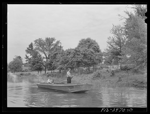 Tennessee River, Alabama (Tennessee Valley Authority (TVA)). Spraying the banks of the Tennessee River to destroy mosquitoes which carry malaria
