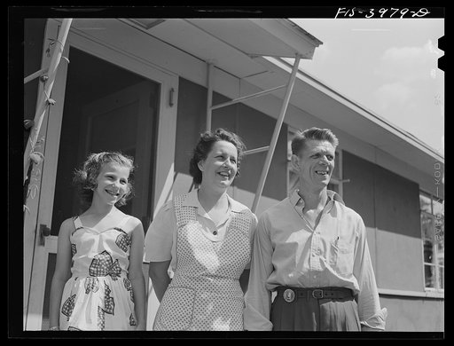 Sheffield, Alabama (Tennessee Valley Authority(TVA)). Kenneth C. Hall with his wife, Helen Louise, and daughter Peggy. Mr. Hall is a foreman in the hot rolling mill at the Reynolds Metals Company, an aluminum plant using TVA electricity. He lives in a TVA defense house at Sheffield, Alabama