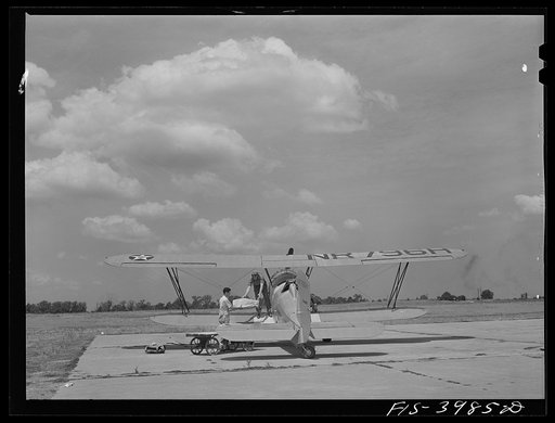 Wilson Dam, Alabama (Tennessee Valley Authority (TVA)). Loading insecticide into plane used in malaria control work
