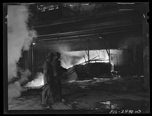 Untitled photo, possibly related to: Wilson Dam, Alabama (Tennessee Valley Authority (TVA)). Tapping the slag at a phosphorus furnace at a chemical plant