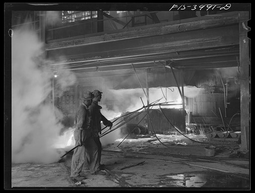 Wilson Dam, Alabama (Tennessee Valley Authority (TVA)). Tapping the slag at a phosphorus furnace at a chemical plant