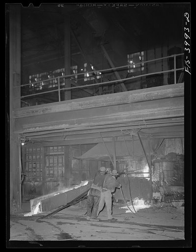 Untitled photo, possibly related to: Wilson Dam, Alabama (Tennessee Valley Authority (TVA)). Tapping the slag at a phosphorus furnace at a chemical plant