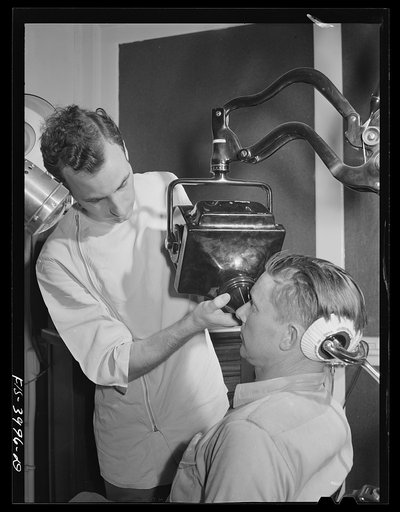 Wilson Dam, Alabama (Tennessee Valley Authority (TVA)). Dentist uses the X-ray on a TVA chemical worker