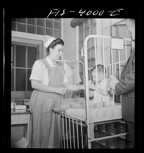 Washington, D.C. Mr. Lund, who is head of the District Red Cross, visits the Children's Hospital where General MacArthur's niece is a nurse's aid