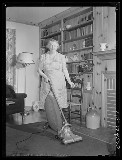 Knox County, Tennessee (Tennessee Valley Authority (TVA)). Mrs. Wiegel uses electric vacuum cleaner