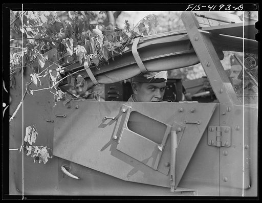 Untitled photo, possibly related to: Fort Riley, Kansas. Scout car attached to a Signal Corps unit on a field problem