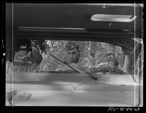Untitled photo, possibly related to: Fort Riley, Kansas. Scout car attached to a Signal Corps unit on a field problem