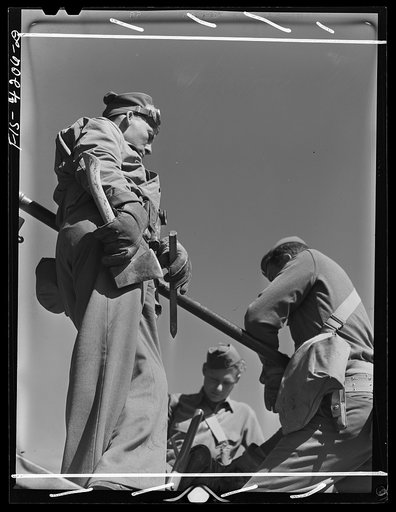 Fort Riley, Kansas. Signal Corps wirelaying crew during a field problem