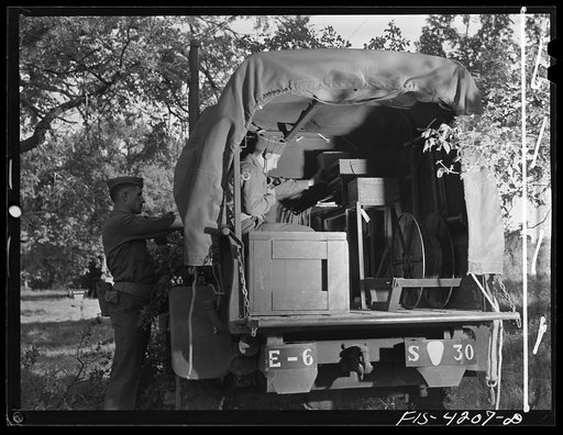 Fort Riley, Kansas. Switchboard truck established by the Signal Corps during a field problem