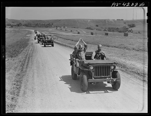 Fort Riley, Kansas. A platoon of a mechanized cavalry reconnaissance unit returning from a day in the field