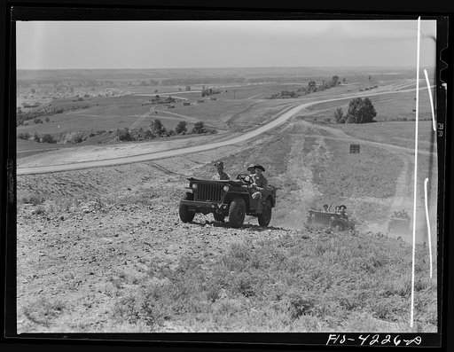 Fort Riley, Kansas. Jeeps of a mechanized cavalry reconnaissance unit going out on a field problem