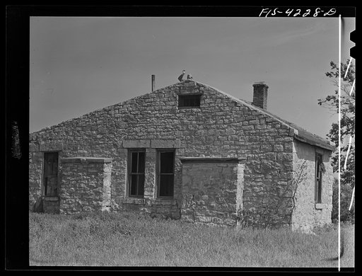 Untitled photo, possibly related to: Fort Riley, Kansas. Soldier of a reconnaissance unit during a sham battle in which his platoon was engaged in a delaying action