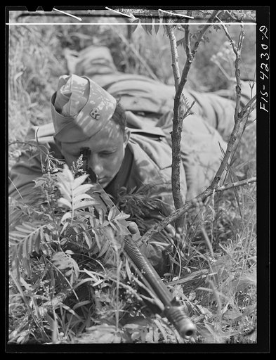 Fort Riley, Kansas. Soldier of a mechanized cavalry reconnaissance unit during a sham battle