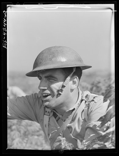 Untitled photo, possibly related to: Fort Riley, Kansas. Lieutenant of a cavalry troop shouting orders