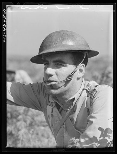 Untitled photo, possibly related to: Fort Riley, Kansas. Lieutenant of a cavalry troop shouting orders