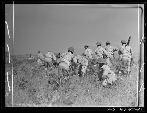 Fort Riley, Kansas. Soldiers of a calvary troop setting up machine guns during a sham battle