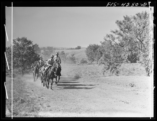 Fort Riley, Kansas. Soldiers with a pack horse carrying a machine gun