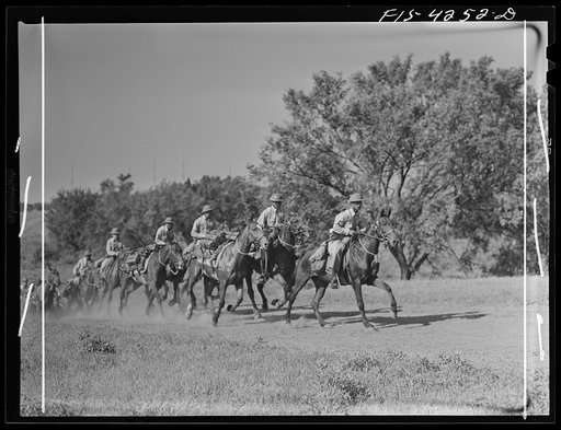 Fort Riley, Kansas. A platoon of cavalry returning to camp after a field problem