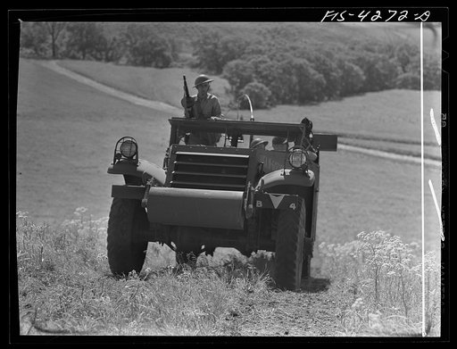 Untitled photo, possibly related to: Fort Riley, Kansas. During a field problem of a mechanized cavalry reconnaissance unit