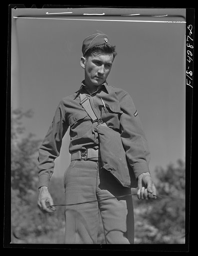Fort Riley, Kansas. Laying wire during a field problem of the Signal Corps unit attached to the cavalry