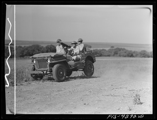 Untitled photo, possibly related to: Fort Riley, Kansas. During a field problem of a mechanized cavalry reconnaissance unit