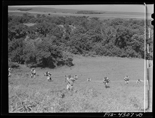 Fort Riley, Kansas. A reconnaissance unit attacking a hill during a sham battle