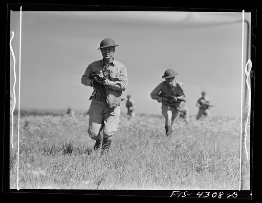 Fort Riley, Kansas. A reconnaissance unit attacking a hill during a sham battle